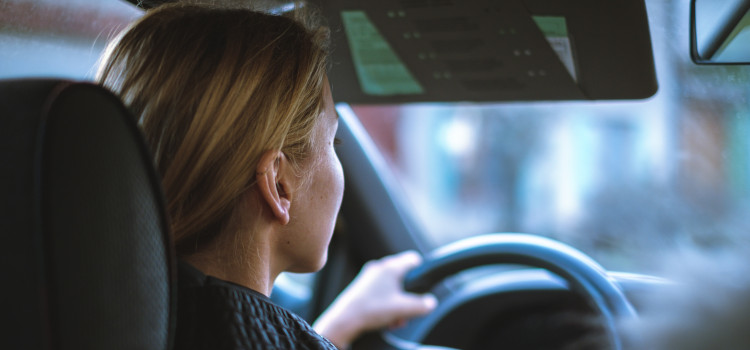 Driver driving a car